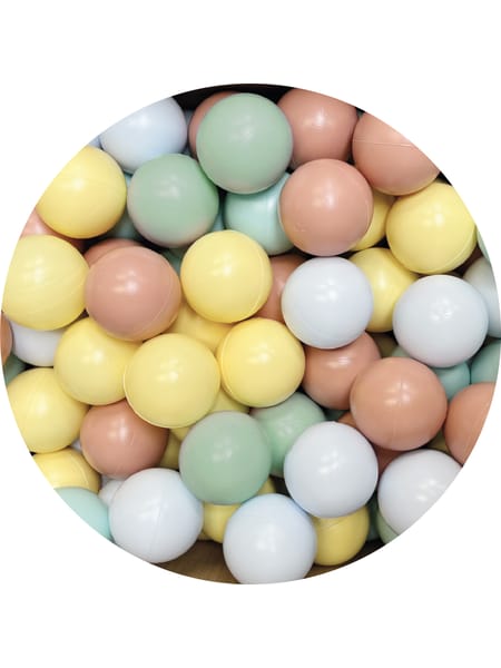 Pastellfarvede runde kugler i mint, gul, lyseblå og rosa i en cirkulær samling.